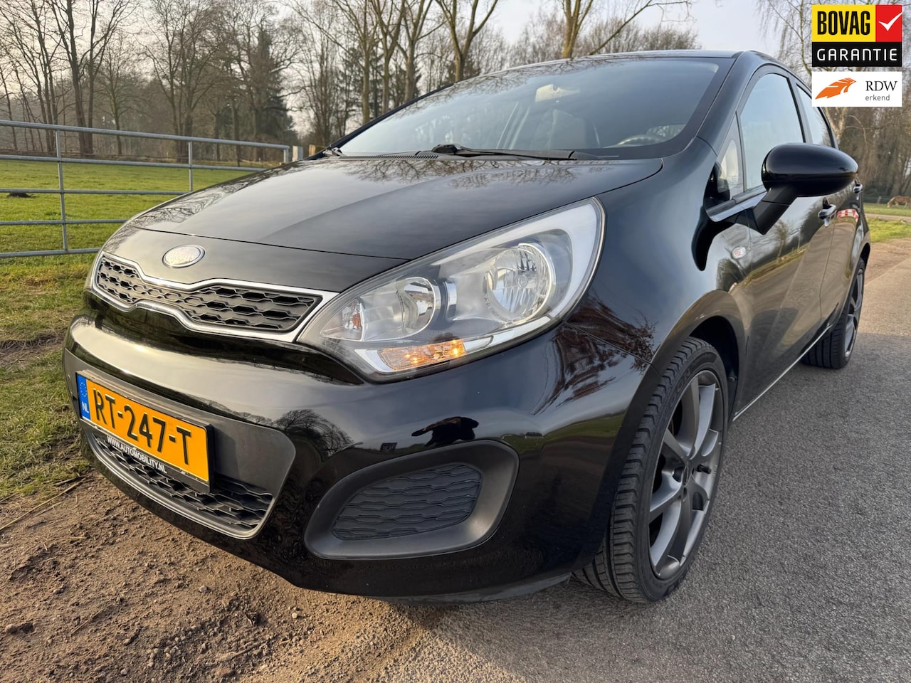 Kia Rio - 1.2 CVVT keurig netjes met airco - AutoWereld.nl