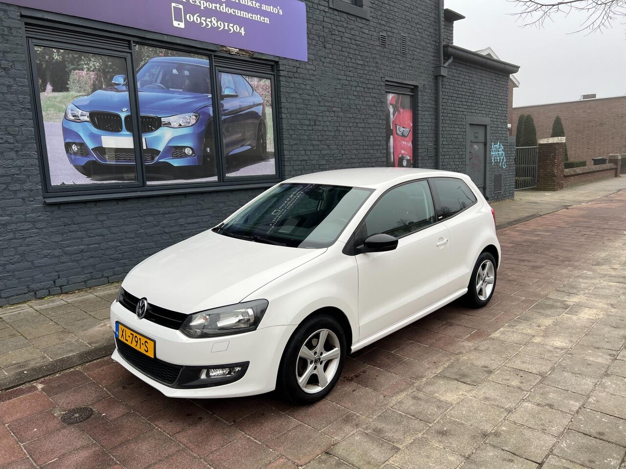 Volkswagen Polo - 1.2 Easyline navi stoelverwarming cruise parksensor - AutoWereld.nl