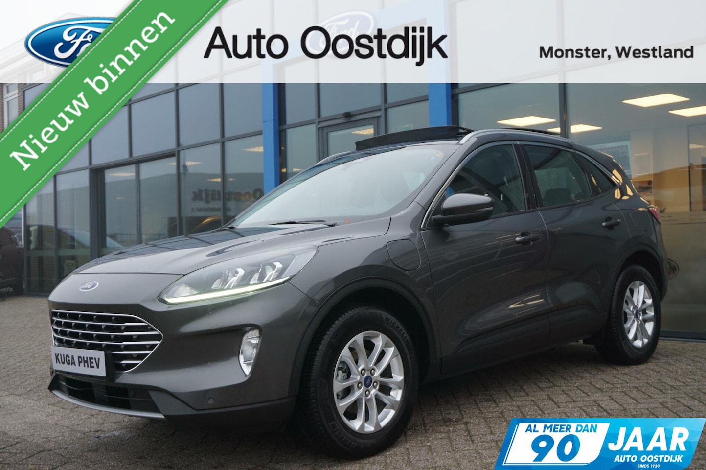 Ford Kuga - 2.5 PHEV Titanium 225PK Panodak Winterpack Climate Control Cruise Control Parkeersensoren - AutoWereld.nl