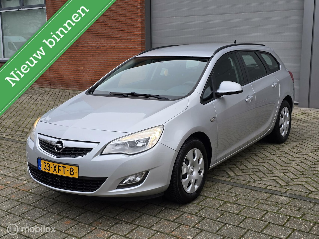 Opel Astra Sports Tourer - 1.4 Anniversary Edition 1.4 Anniversary Edition - AutoWereld.nl