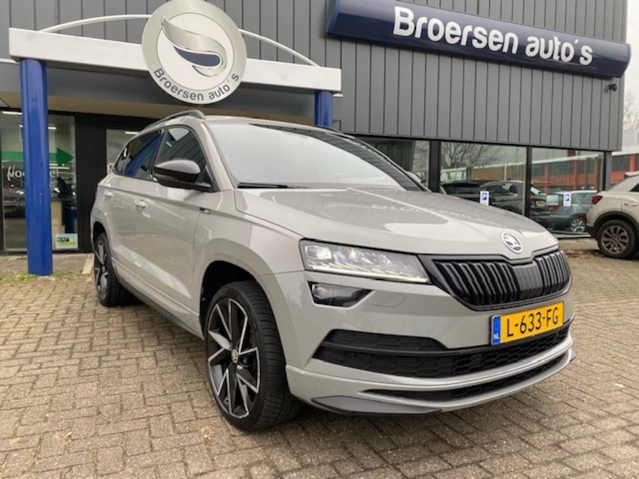 Skoda Karoq - 1.5 TSI 150pk Sportline Business met Camera, Smartlink en Stuurverw. - AutoWereld.nl