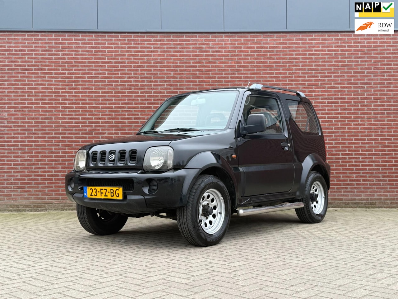 Suzuki Jimny - 1.3 JLX / NAP / 4X4 / Airco Trekhaak - AutoWereld.nl