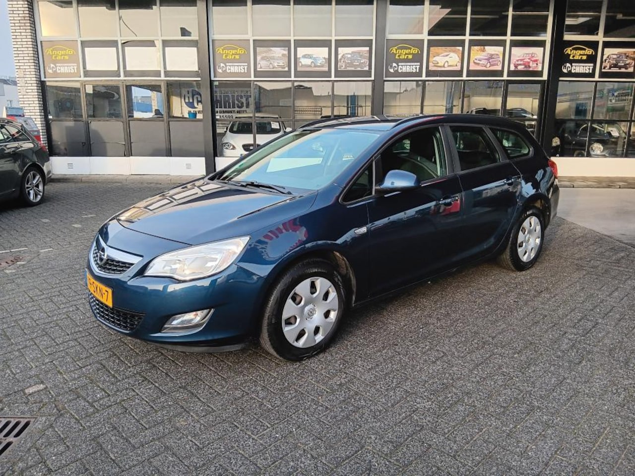 Opel Astra Sports Tourer - 1.4 Turbo Edition 1.4 Turbo Edition - AutoWereld.nl