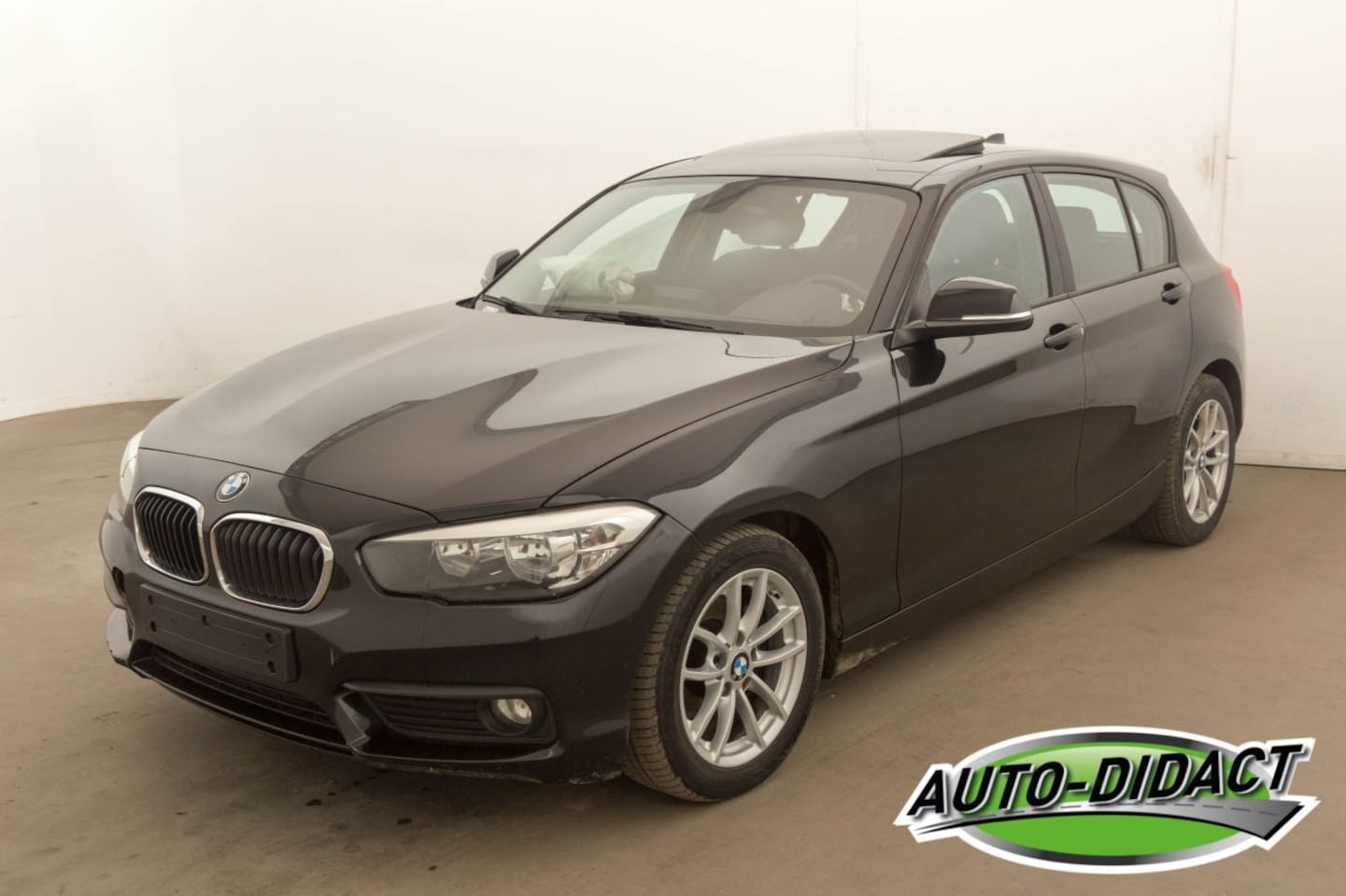 BMW 1-serie - 116D Open dak Navi - AutoWereld.nl