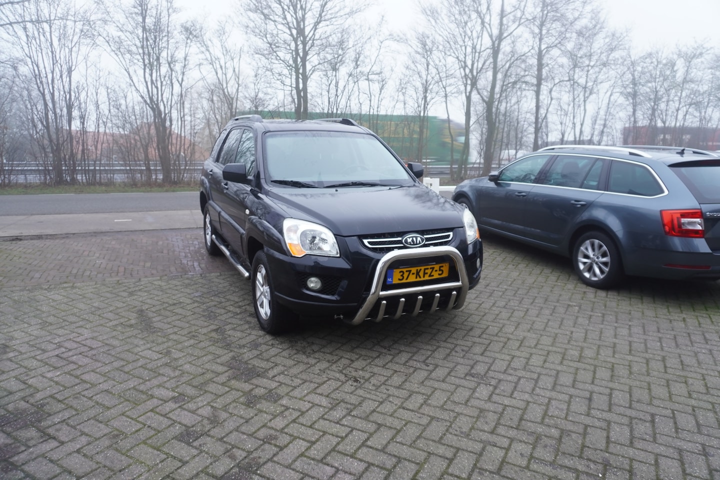 Kia Sportage - 2.0 CVVT X-tra TREKHAAK CRUISE - AutoWereld.nl