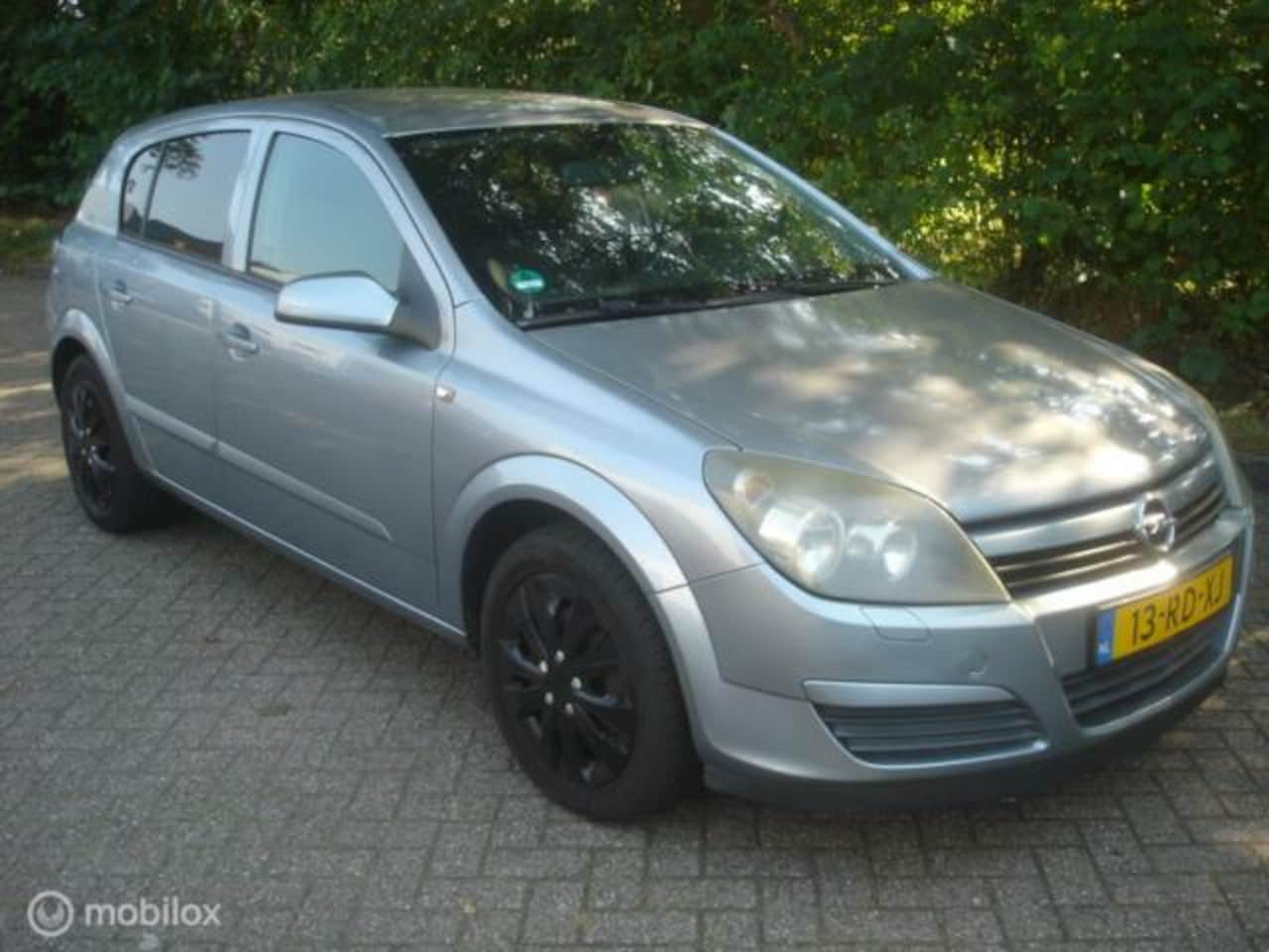 Opel Astra - 1.6 I 16V Elegance Airco - Cruise. Motor rookt - AutoWereld.nl