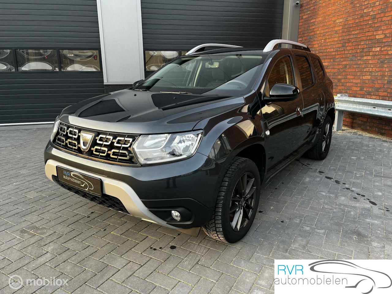 Dacia Duster - 1.0 TCe Bi-Fuel Prestige/NAVI/CRUISE/CAMERA - AutoWereld.nl