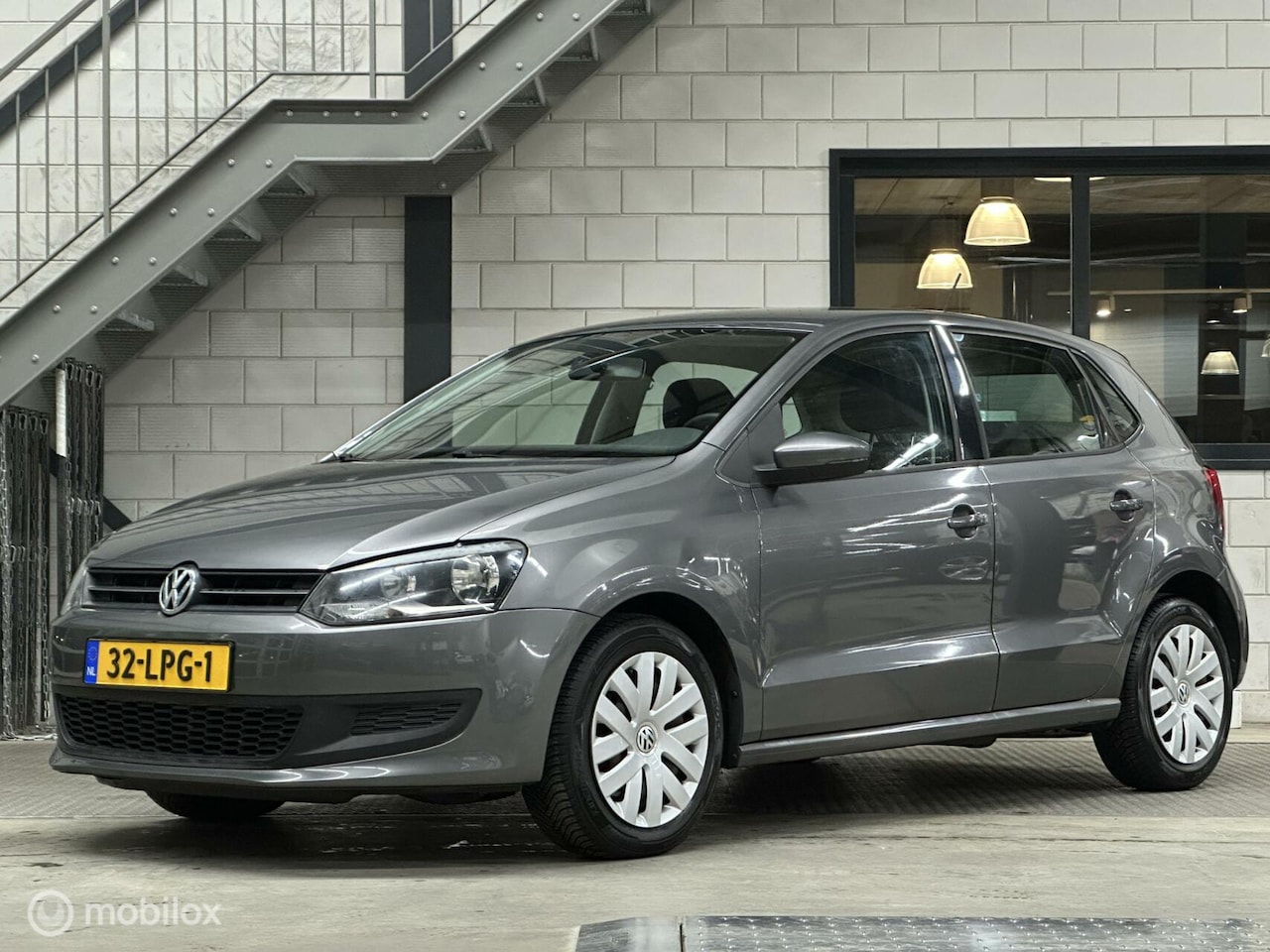 Volkswagen Polo - 1.4-16V Comfortline CARPLAY, CRUISE, A/C - AutoWereld.nl