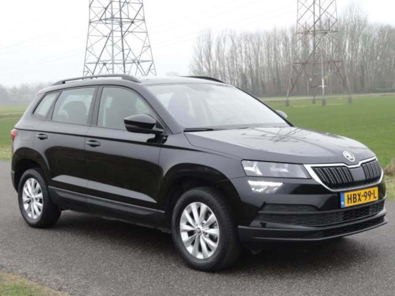 Skoda Karoq - 1.0TSI Business Met ECC I NAVIG I ANDROID I LED - AutoWereld.nl