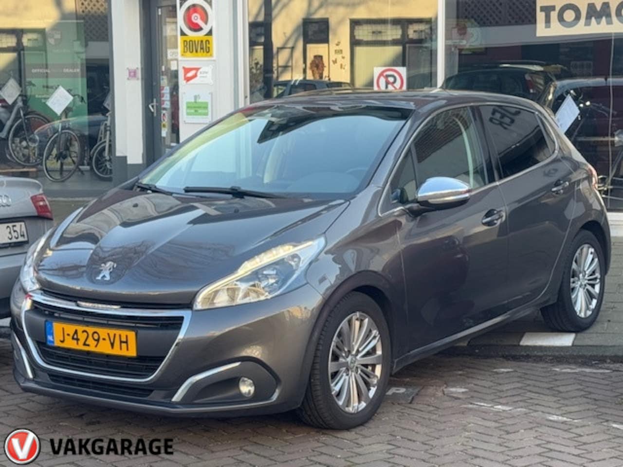 Peugeot 208 - 1.2 PureT. Signature - AutoWereld.nl