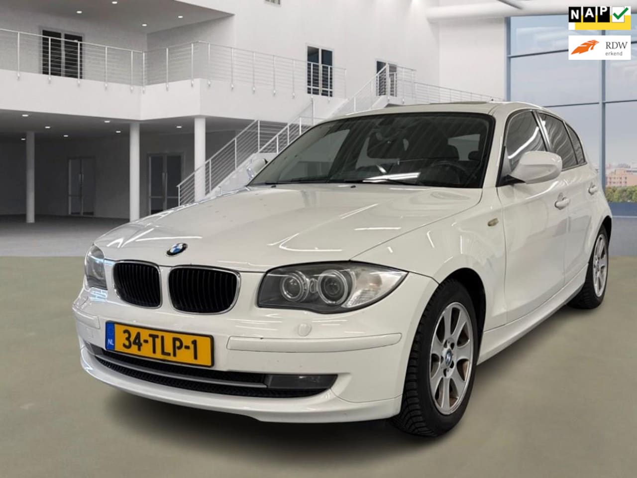 BMW 1-serie - 116i High Executive/SCHUIFDAK/XENON/STOELVERW/NAVI/ - AutoWereld.nl