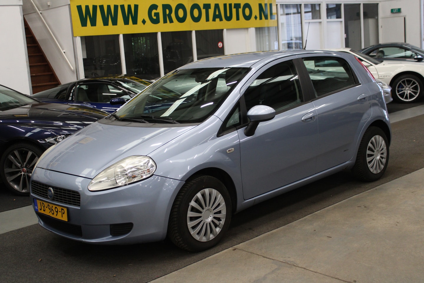 Fiat Grande Punto - 1.4 Active OPKNAPPER Airco, Isofix, Stuurbekrachtiging - AutoWereld.nl