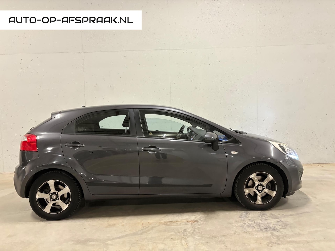 Kia Rio - 1.4 CVVT Automaat Navi Clima PDC APK NAP - AutoWereld.nl