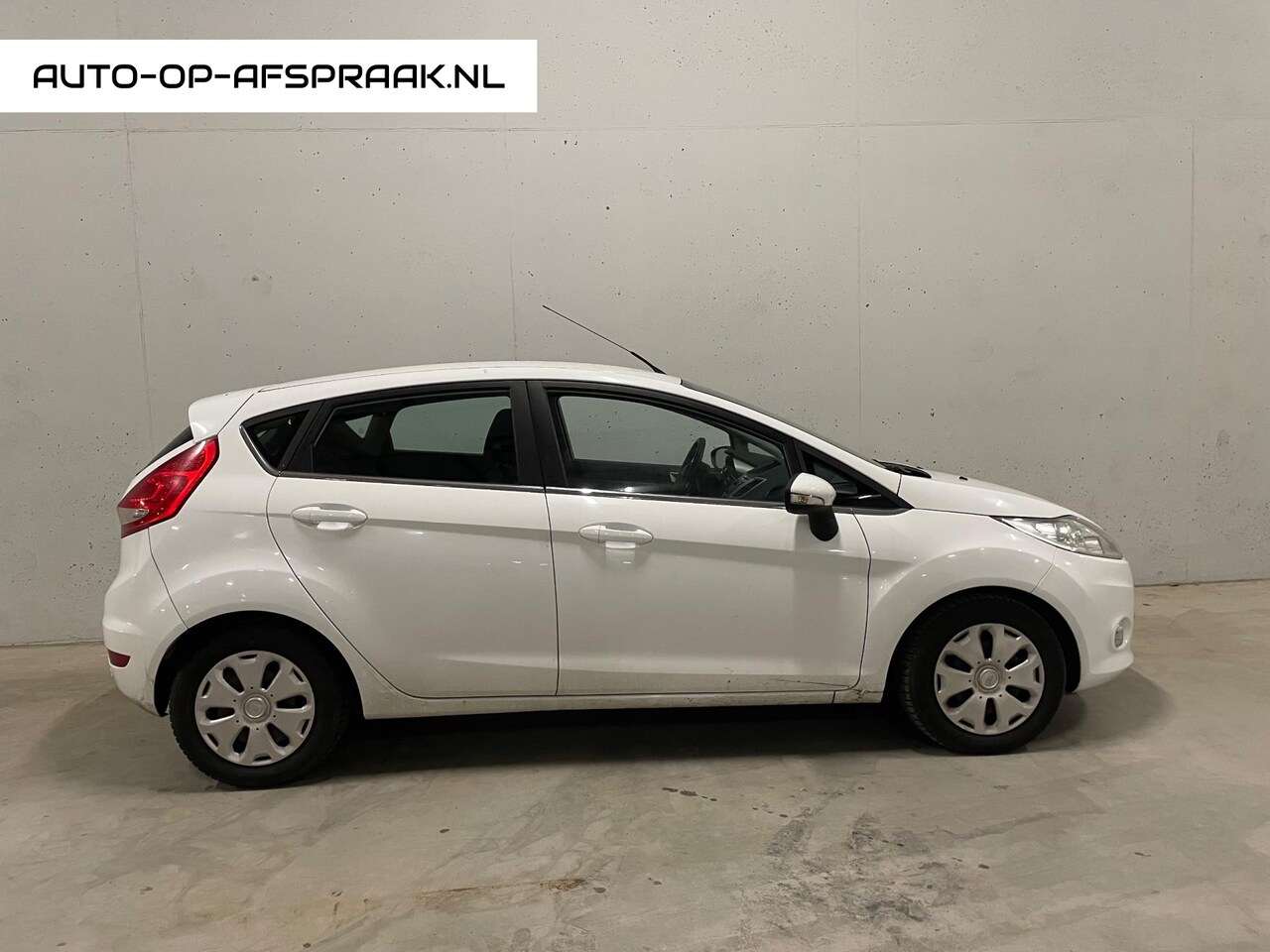 Ford Fiesta - 1.6 TDCi ECOnetic Titanium 5drs. Clima Cruise C. - AutoWereld.nl