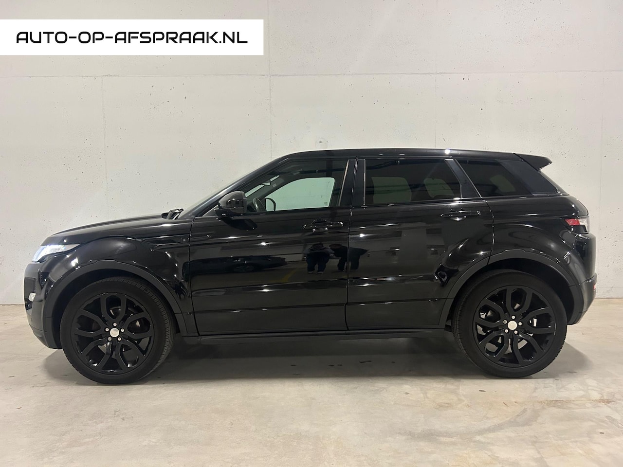 Land Rover Range Rover Evoque - 2.2 TD4 4WD Leer Navi Stoelv. - AutoWereld.nl