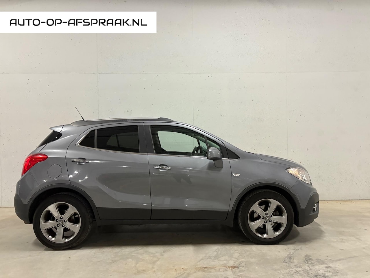 Opel Mokka - 1.4 T Cosmo 4x4 Navi Clima Cruise APK - AutoWereld.nl