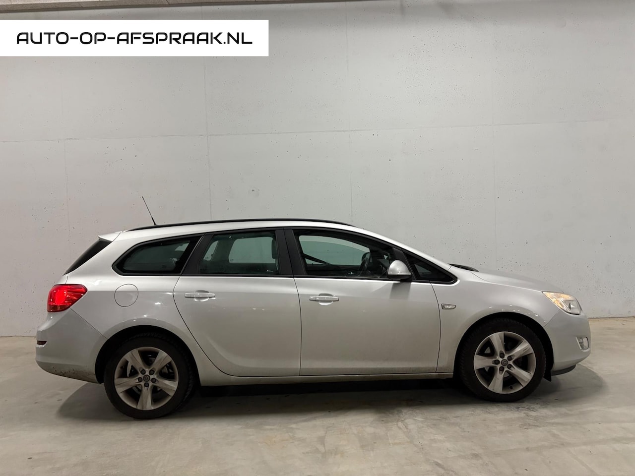 Opel Astra Sports Tourer - 1.4 Turbo Edition Airco APK - AutoWereld.nl