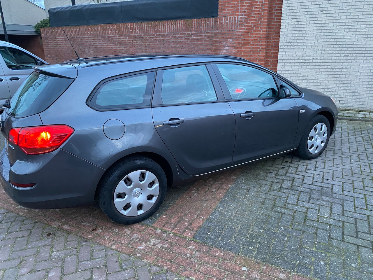 Opel Astra Sports Tourer - 1.4 Edition - AutoWereld.nl