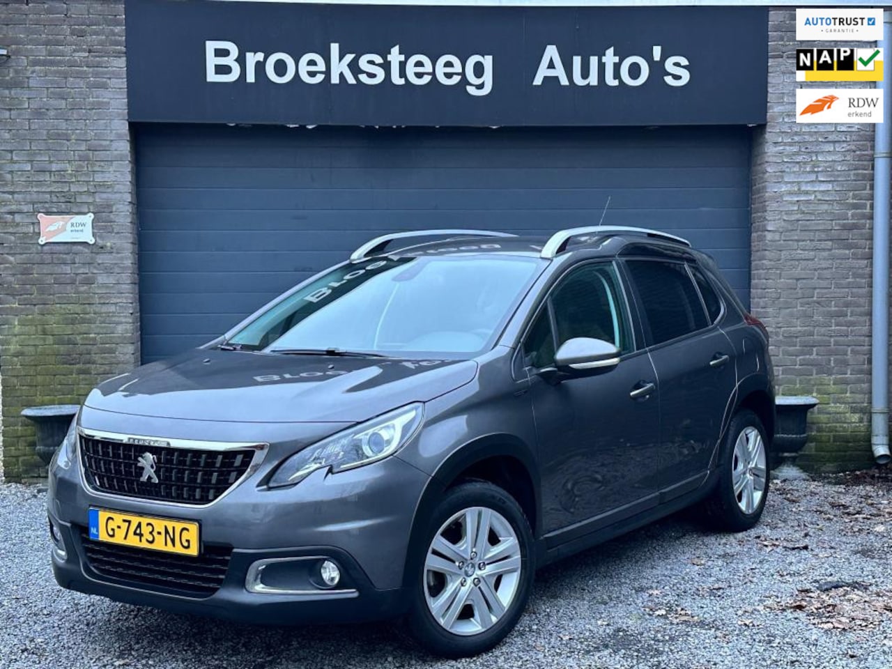 Peugeot 2008 - 1.2 PureTech Signature NLauto/Navi/Trekhaak/Boekjescompleet - AutoWereld.nl