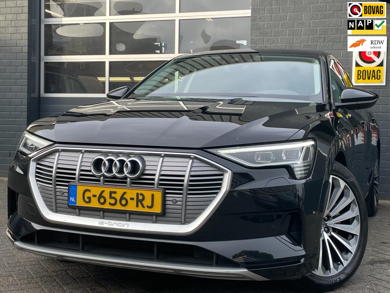 Audi e-tron - E-Tron 55 Quattro Advanced 95 kWh 1/2 LEDER | PANO | CAMERA | ELEK. KLEP | ELEK.INTERIEUR - AutoWereld.nl