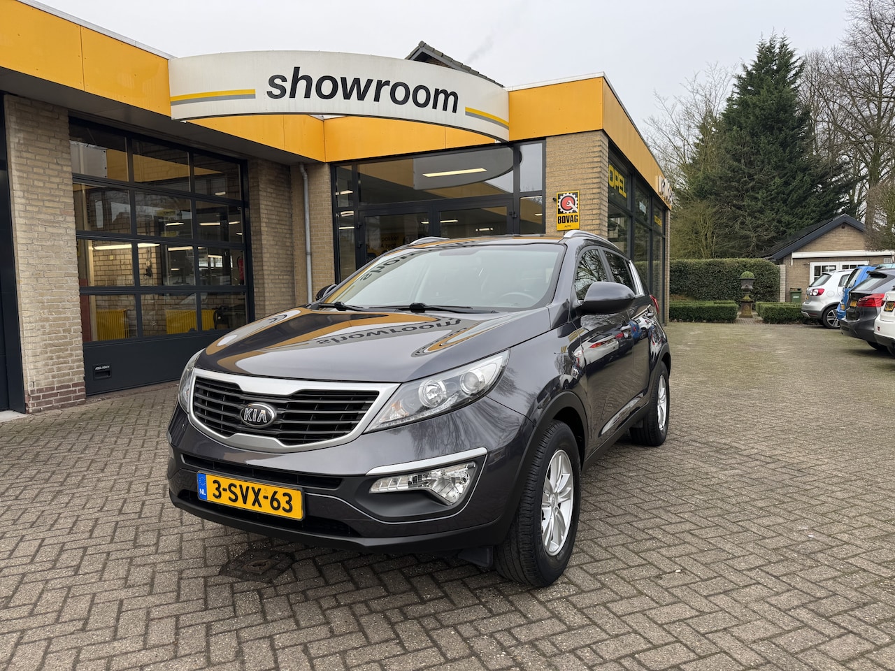 Kia Sportage - 1.6 GDI Vibe Climate Control Navi Camera Leder - AutoWereld.nl