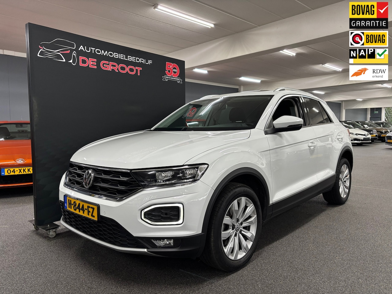 Volkswagen T-Roc - 1.5 TSI Style Business / NL auto / Automaat / Pano - AutoWereld.nl