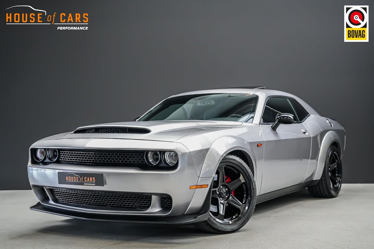 Dodge Challenger - 5.7 377pk V8 Hemi AUTOMAAT |schuif kanteldak|Apple Carplay|JLT lucht inlaat|20" SRT|cruise - AutoWereld.nl