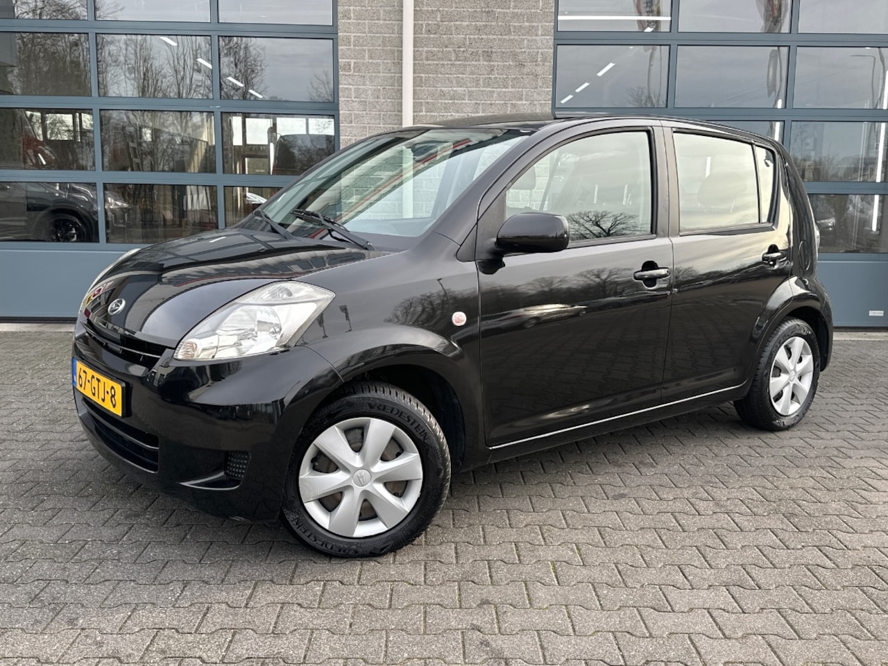 Daihatsu Sirion 2 - 1.0-12V Premium 1.0-12V Premium - AutoWereld.nl