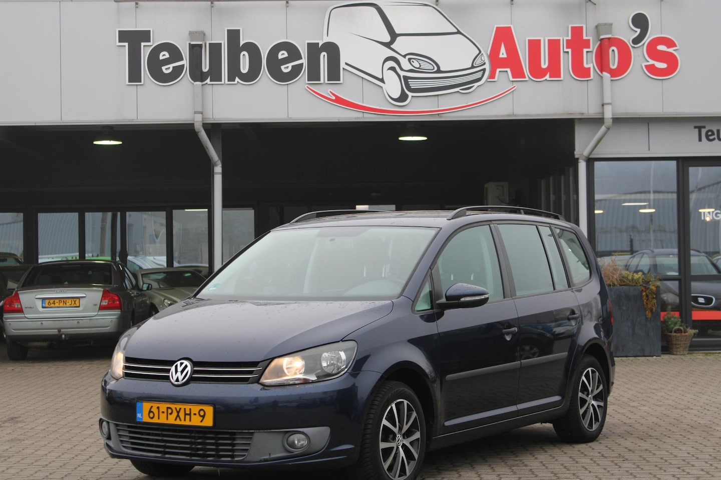 Volkswagen Touran - 1.2 TSI Trendline BlueMotion Navigatie, Airco, Cruise control, Lichtmetalen wielen, Trekha - AutoWereld.nl