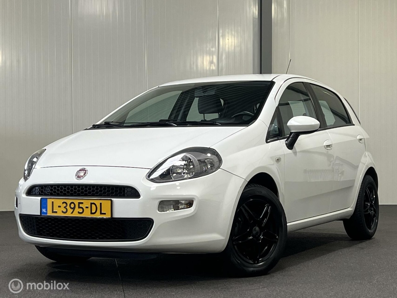 Fiat Punto Evo - 5-drs 1.4 Edizione Cool - AutoWereld.nl