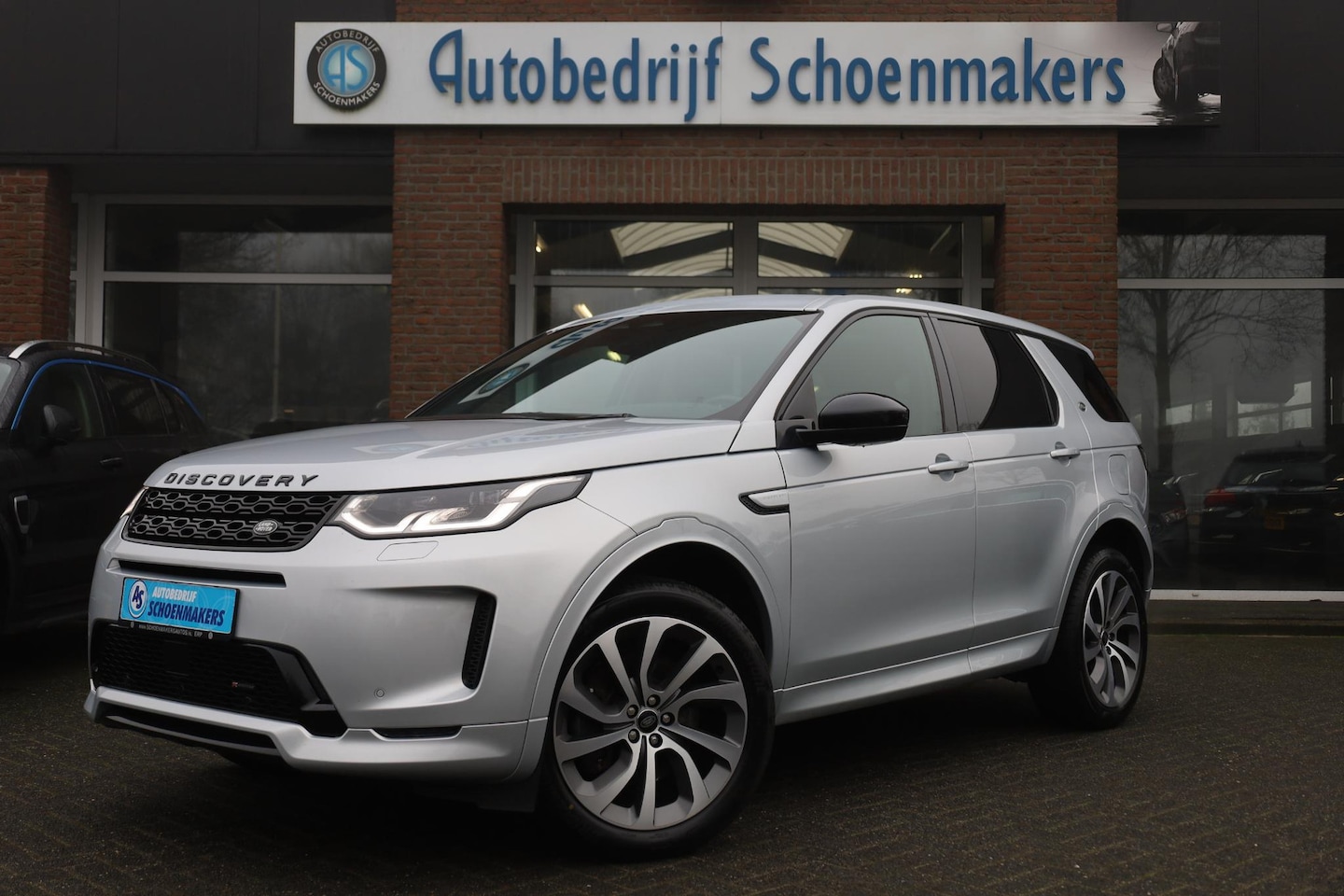 Land Rover Discovery Sport - P300e 1.5 R-Dynamic PANO WINDSOR-LEER MEMORY ELEK.TREKHAAK 20"LMV CAMERA RUITVERWARMING ME - AutoWereld.nl