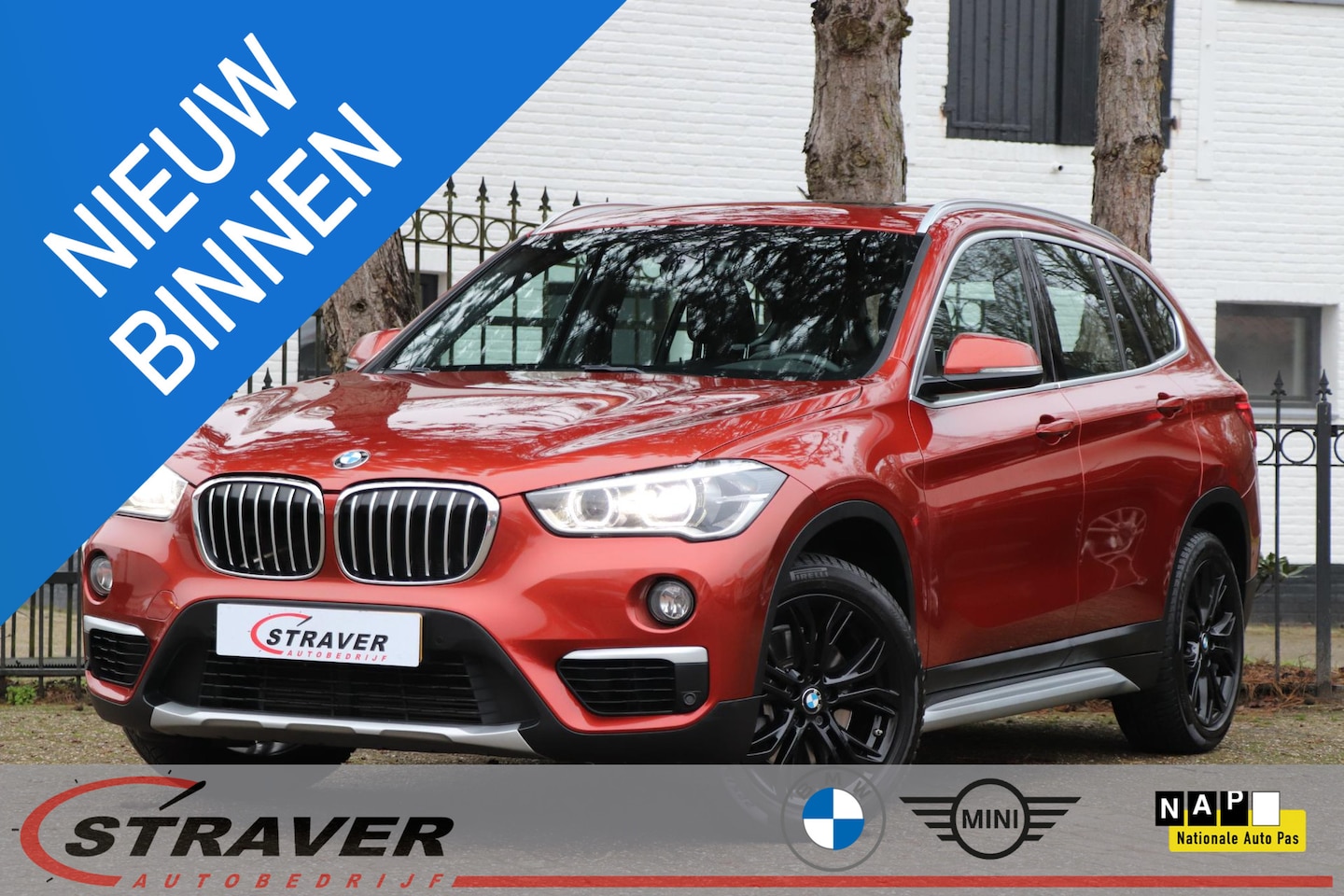 BMW X1 - sDrive20i Orange Edition II |Panorama dak| Trekhaak |Camera - AutoWereld.nl