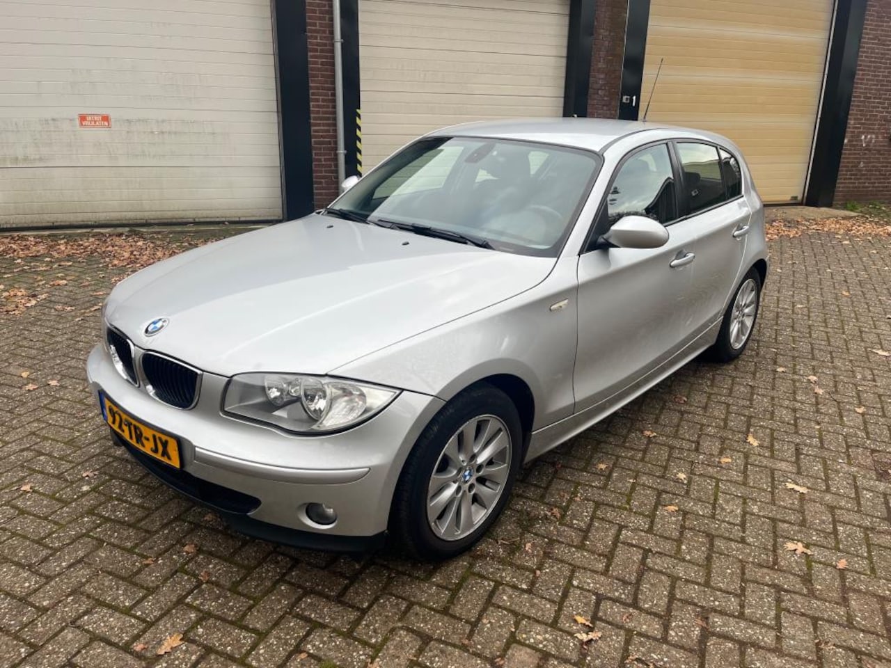 BMW 1-serie - 118i High Executive Clima / Cruise - AutoWereld.nl