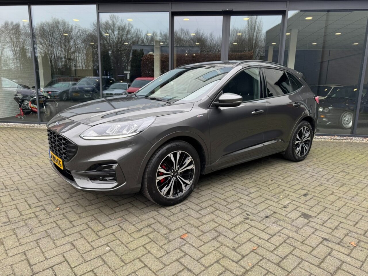 Ford Kuga - 1.5 EcoB. ST-Line,LED,Clima,Trekhk,Lane Ass.,Winterpack,Keyless - AutoWereld.nl