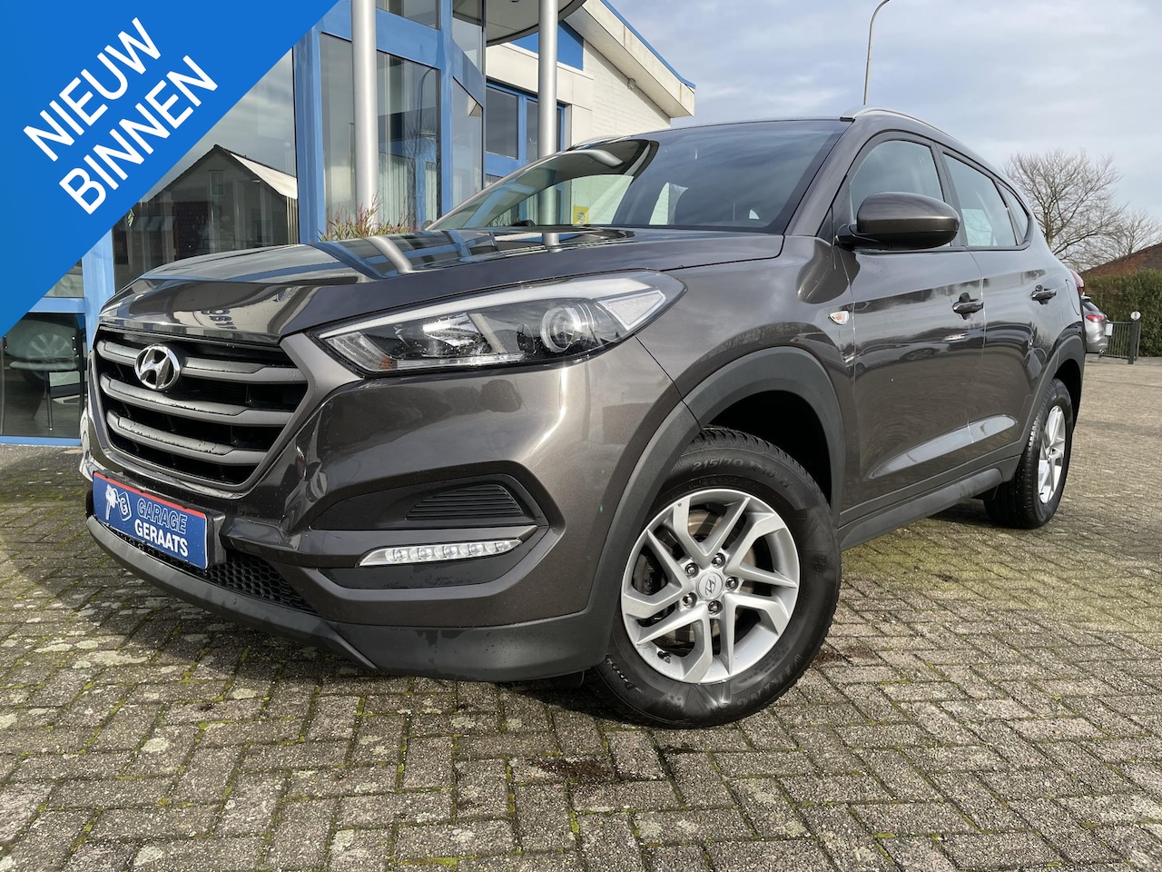 Hyundai Tucson - 1.6 GDi Premium | Full map navigatie, Cruise controle, Camera en parkeersensoren achter, 1 - AutoWereld.nl