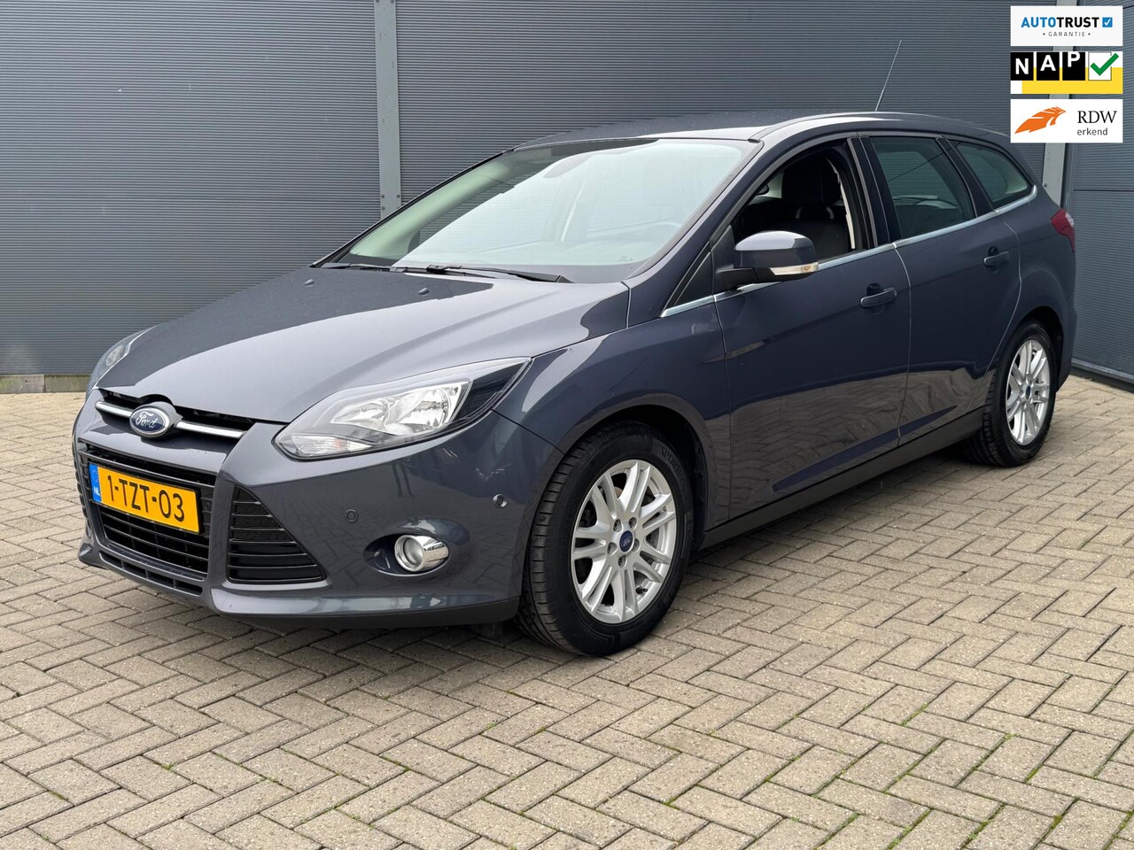 Ford Focus Wagon - 1.0 EcoBoost Edition Plus Navi / Pdc / Trekhaak - AutoWereld.nl