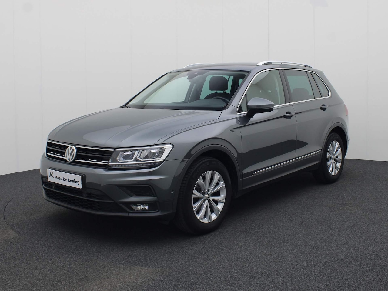 Volkswagen Tiguan - 1.5TSI/150PK Comfortline DSG Navigatie · Trekhaak · Massage functie - AutoWereld.nl