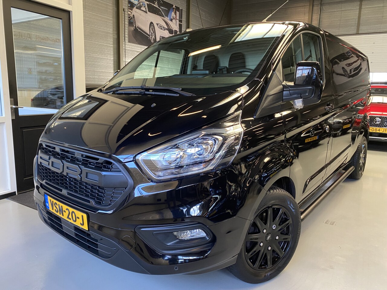 Ford Transit Custom - 300 2.0 TDCI L2H2 Limited Cruise, Camera, Navi, Stoelverwarming, 170 PK - AutoWereld.nl