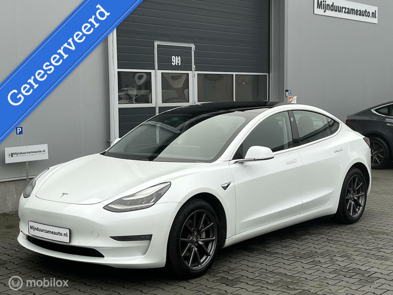 Tesla Model 3 - Long Range RWD Long Range AWD 75 kWh - Trekhaak - Nette auto! - AutoWereld.nl