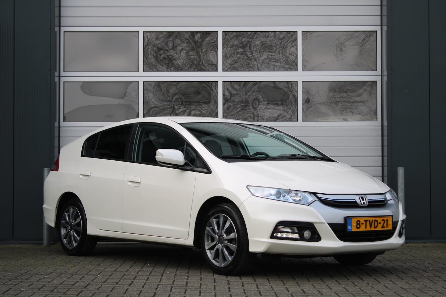 Honda Insight - 1.3 Exclusive Automaat Clima/Cruise/Navi/Bluetooth/PDC/Stoelverwarming/HalfLeder/16"LM/Dea - AutoWereld.nl