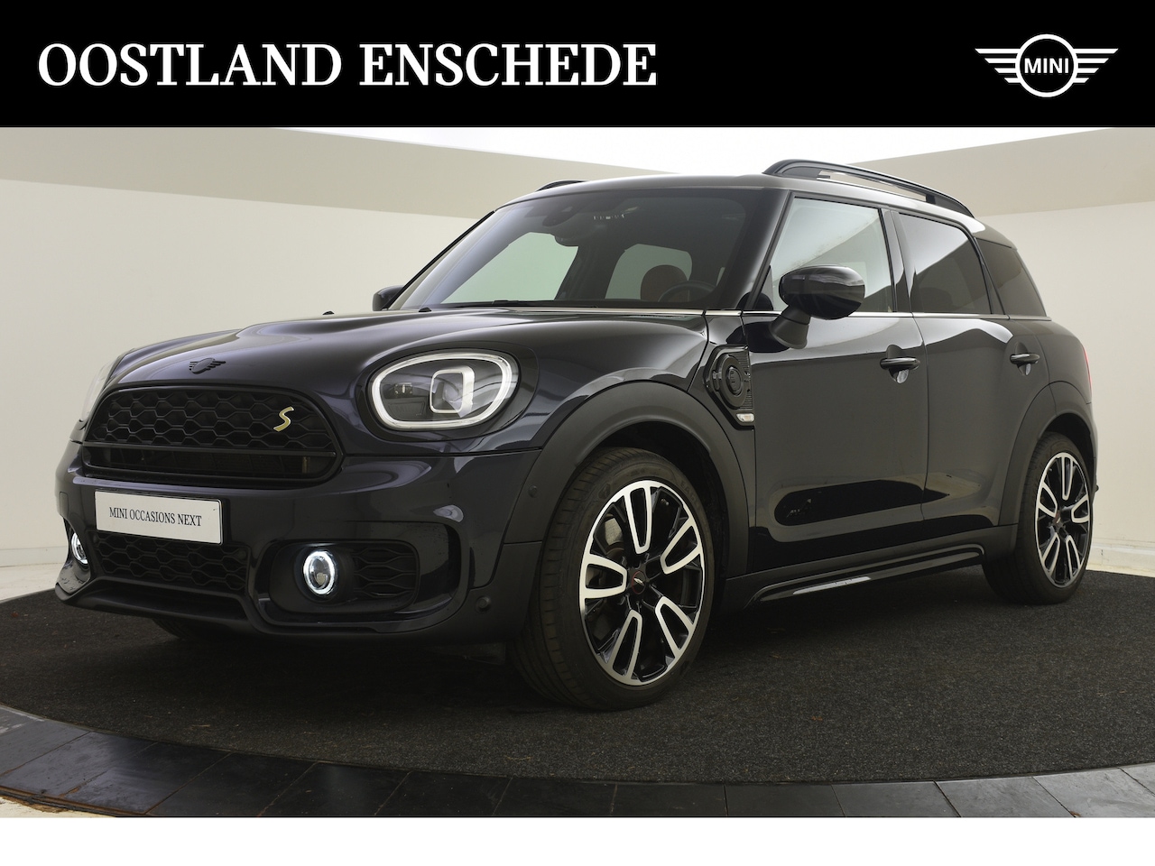 MINI Countryman - Cooper SE ALL4 JCW Automaat / Premium Plus Pakket / Panoramadak / Achteruitrijcamera / Com - AutoWereld.nl