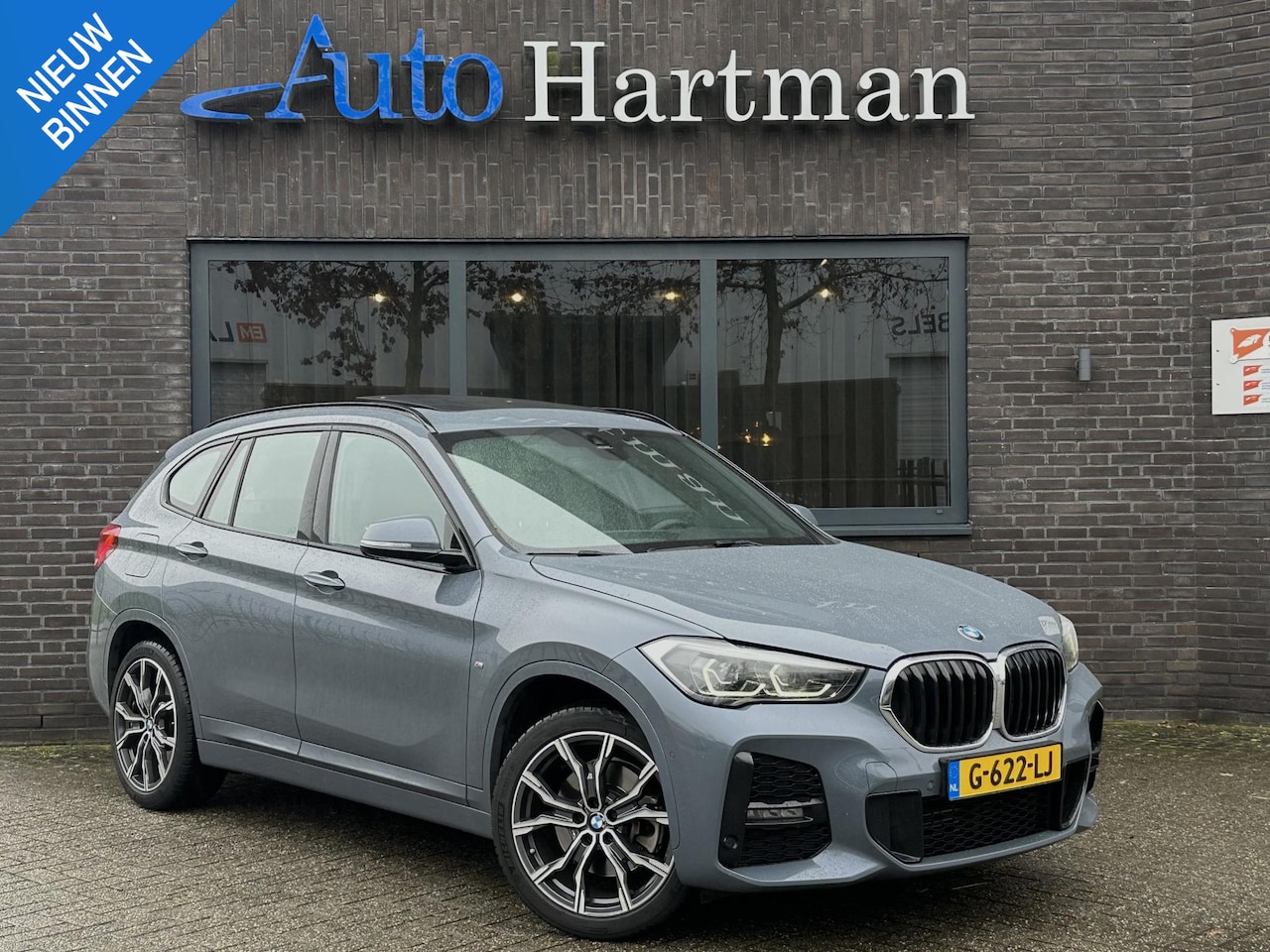 BMW X1 - sDrive20i High Executive M-sport PANO | Leder | HIFI | Head-up - AutoWereld.nl