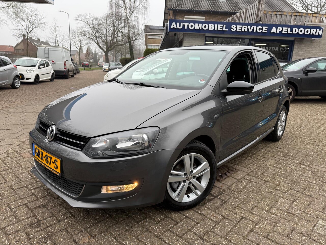 Volkswagen Polo - 1.2 Easyline * 5DRS*AIRCO*NAVI*STOELVERW.*PDC*CRUISE*LM. VELGEN* - AutoWereld.nl