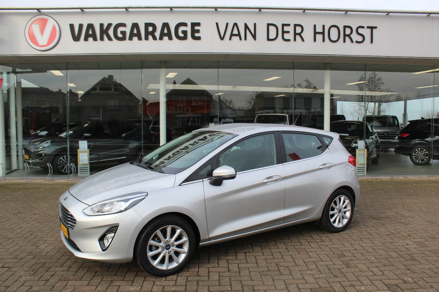 Ford Fiesta - 1.0-100pk EcoBoost Titanium 5drs. Uiterst nette, luxe en zuinige Ford Fiesta. Voalautm. ai - AutoWereld.nl