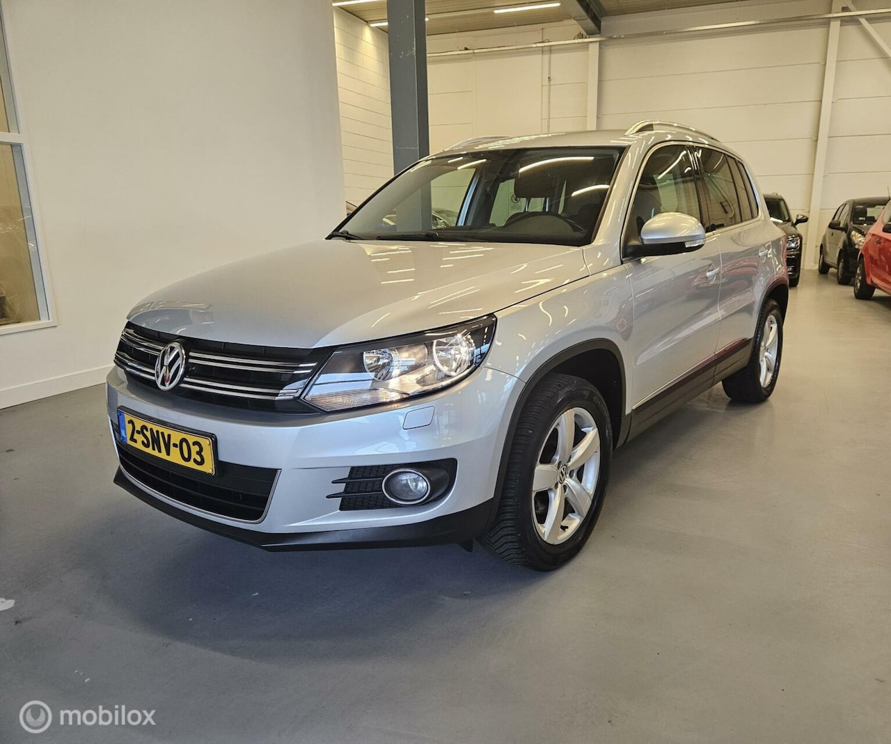 Volkswagen Tiguan - 1.4 TSI Sport&Style R-Line Edition (2013) - AutoWereld.nl