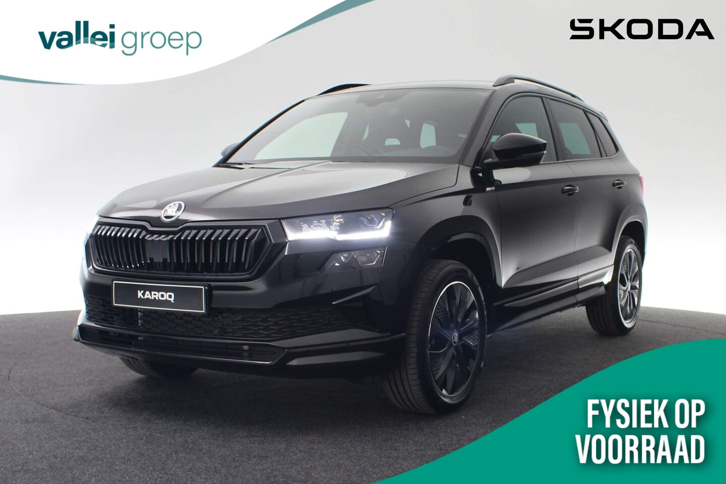 Skoda Karoq - Sportline Business 1.5 TSI 110 kW / 150PK DSG | Camera | Stoelverwarming | Trekhaak | Side - AutoWereld.nl