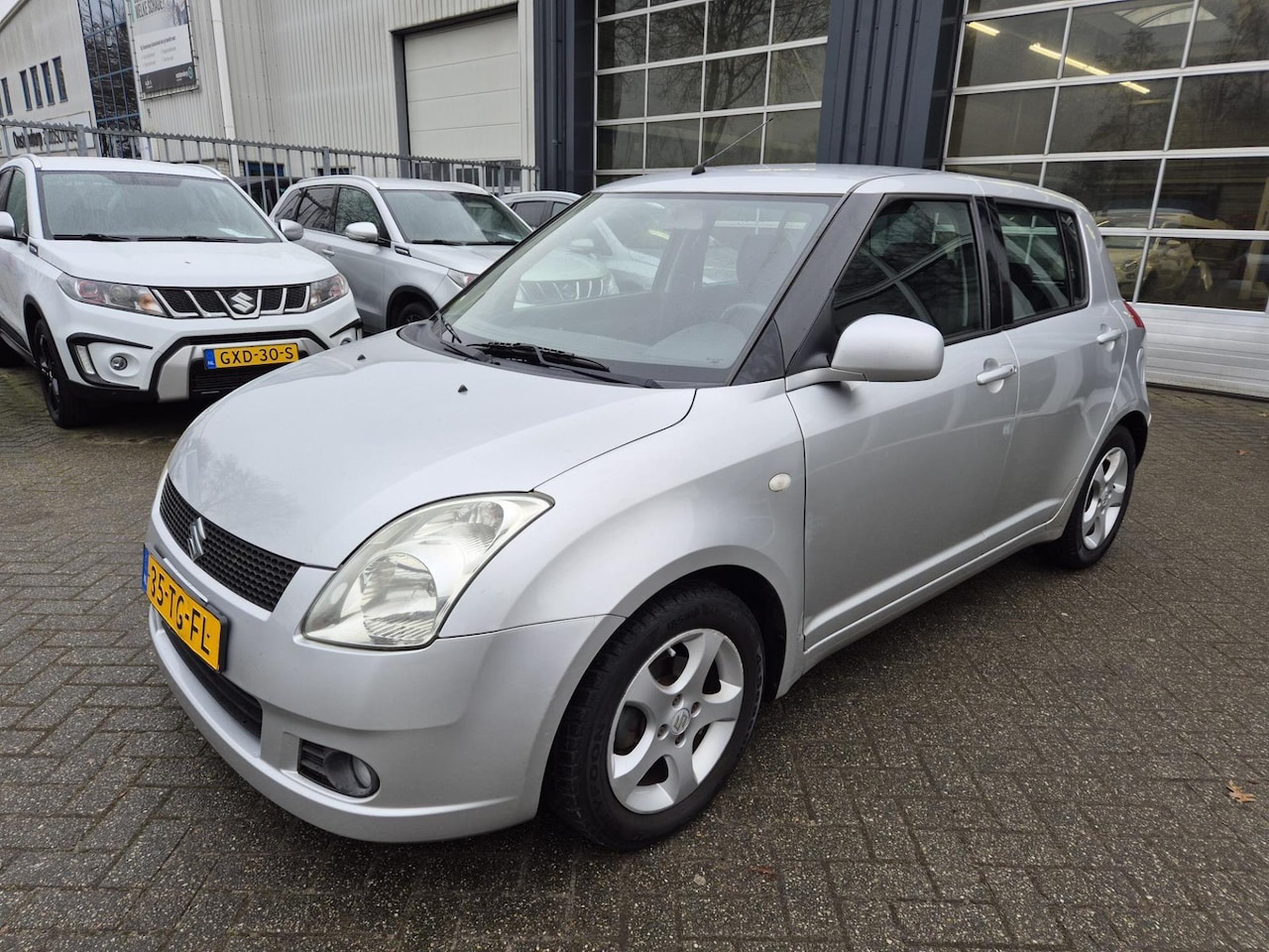 Suzuki Swift - 1.5 Exclusive / nwe apk / garantie - AutoWereld.nl