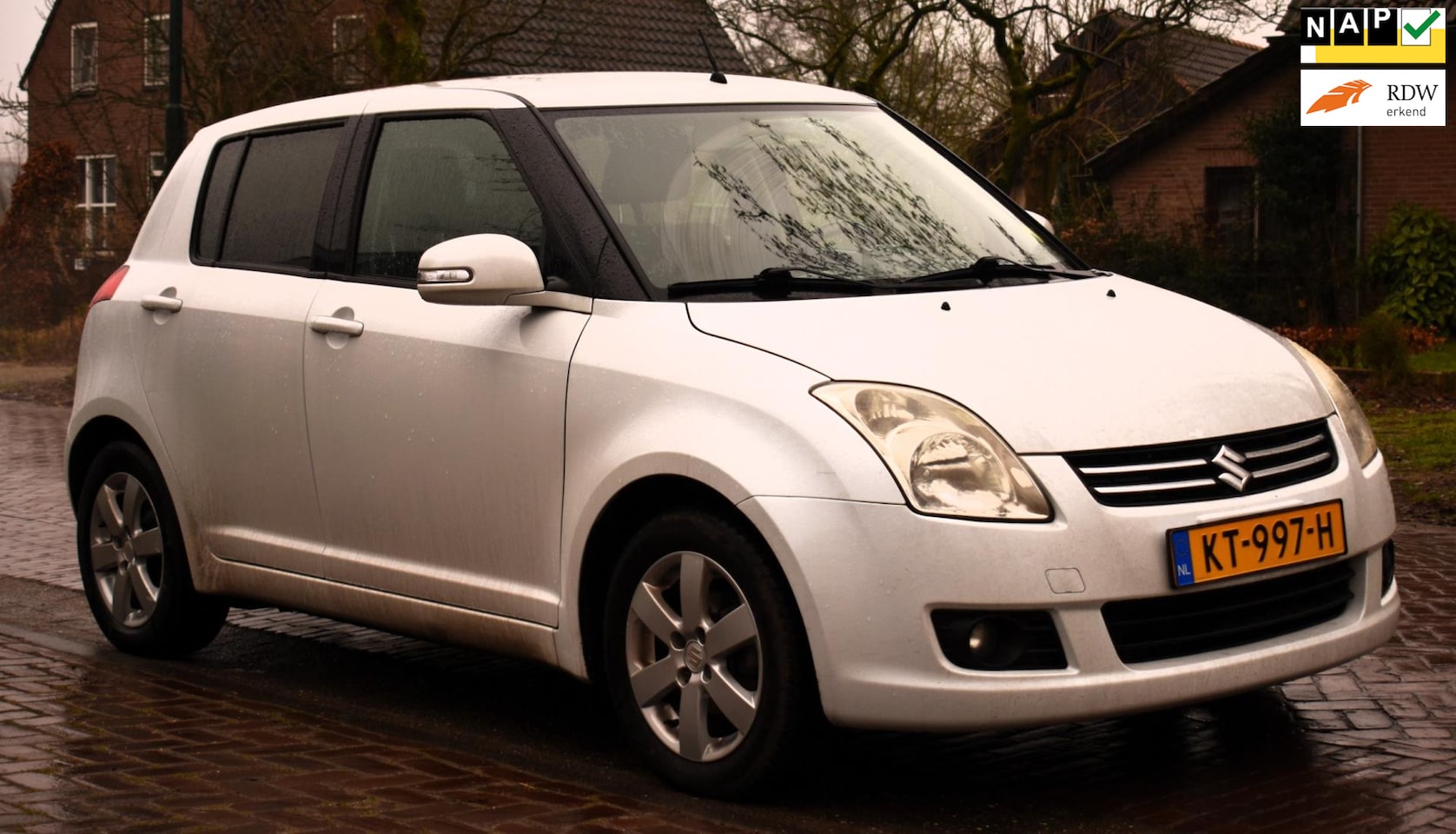 Suzuki Swift - 1.3 Base 5 DEURS MET AIRCO, ELEC. RAMEN EN TREKHAAK! - AutoWereld.nl