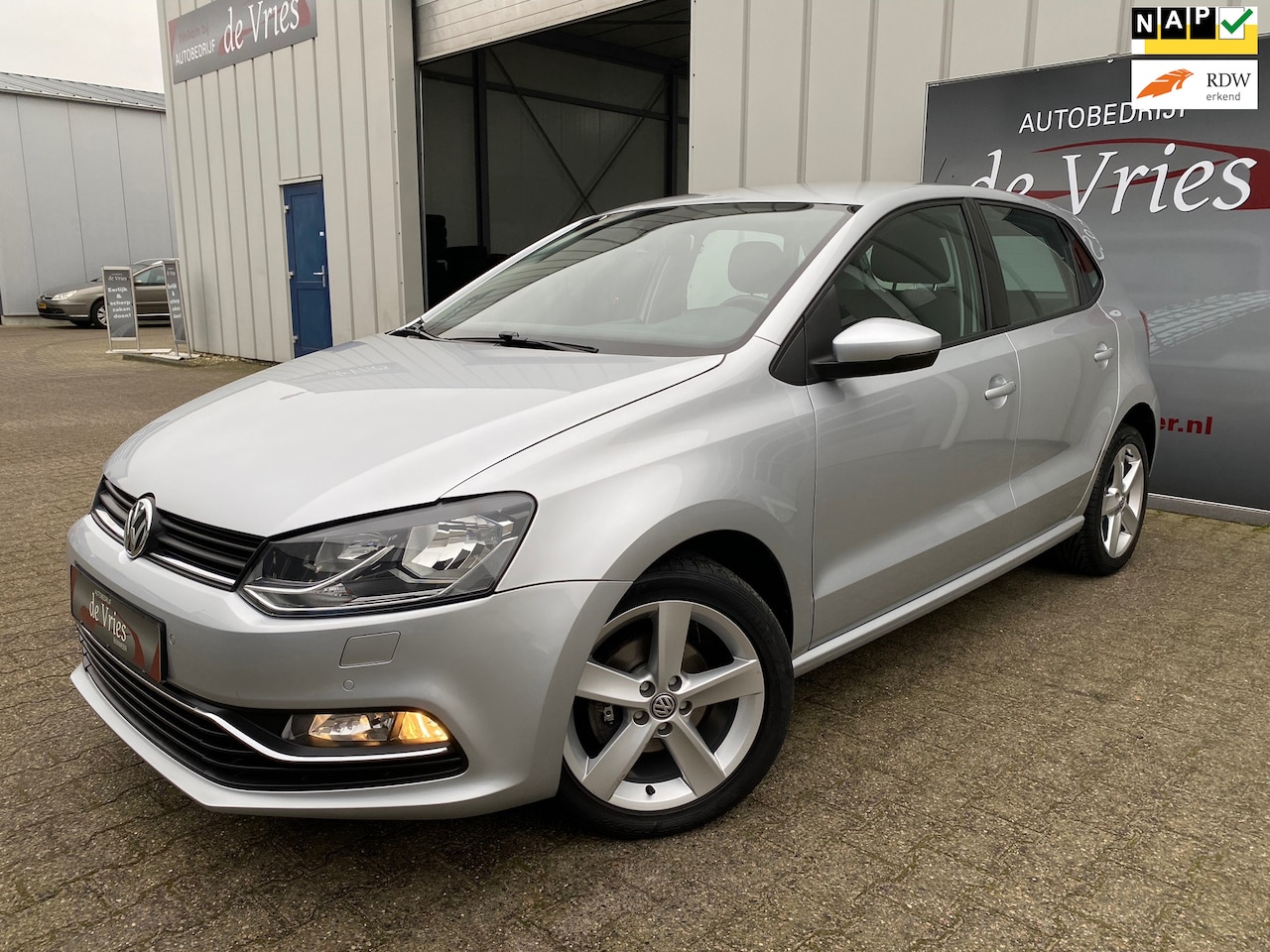 Volkswagen Polo - 1.2 TSI Comfortline 5-Drs. / Clima / Cruise / PDC V&A / Stoelverw. - AutoWereld.nl