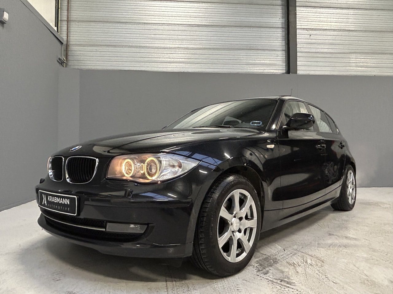 BMW 1-serie - 116i High Executive Trekhaak|Xenon|Youngtimer|Navigatie - AutoWereld.nl